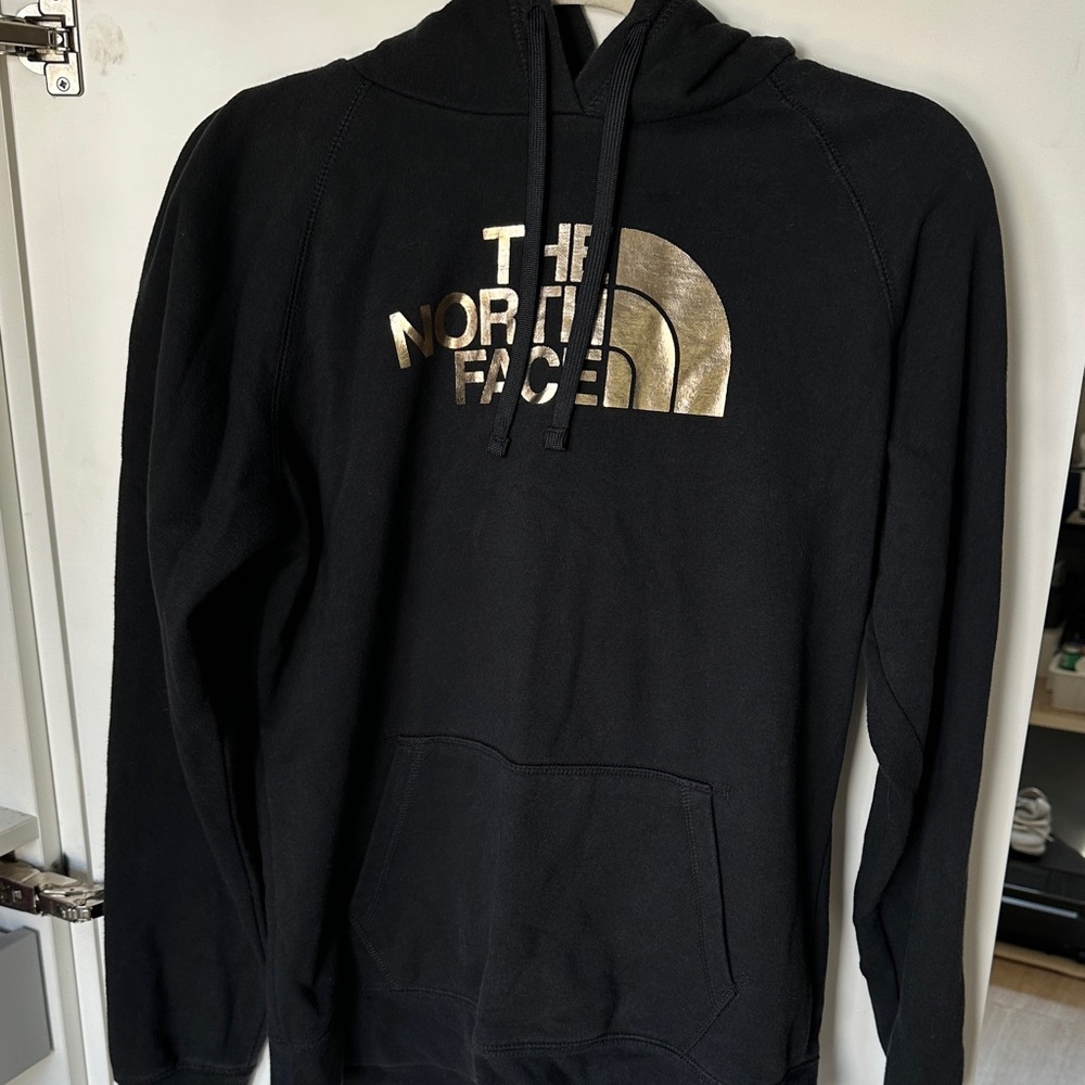 The North Face Black Hoodie with Gold Logo